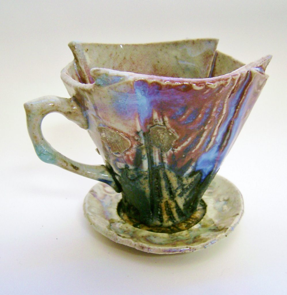 Teacup with blues and reds
